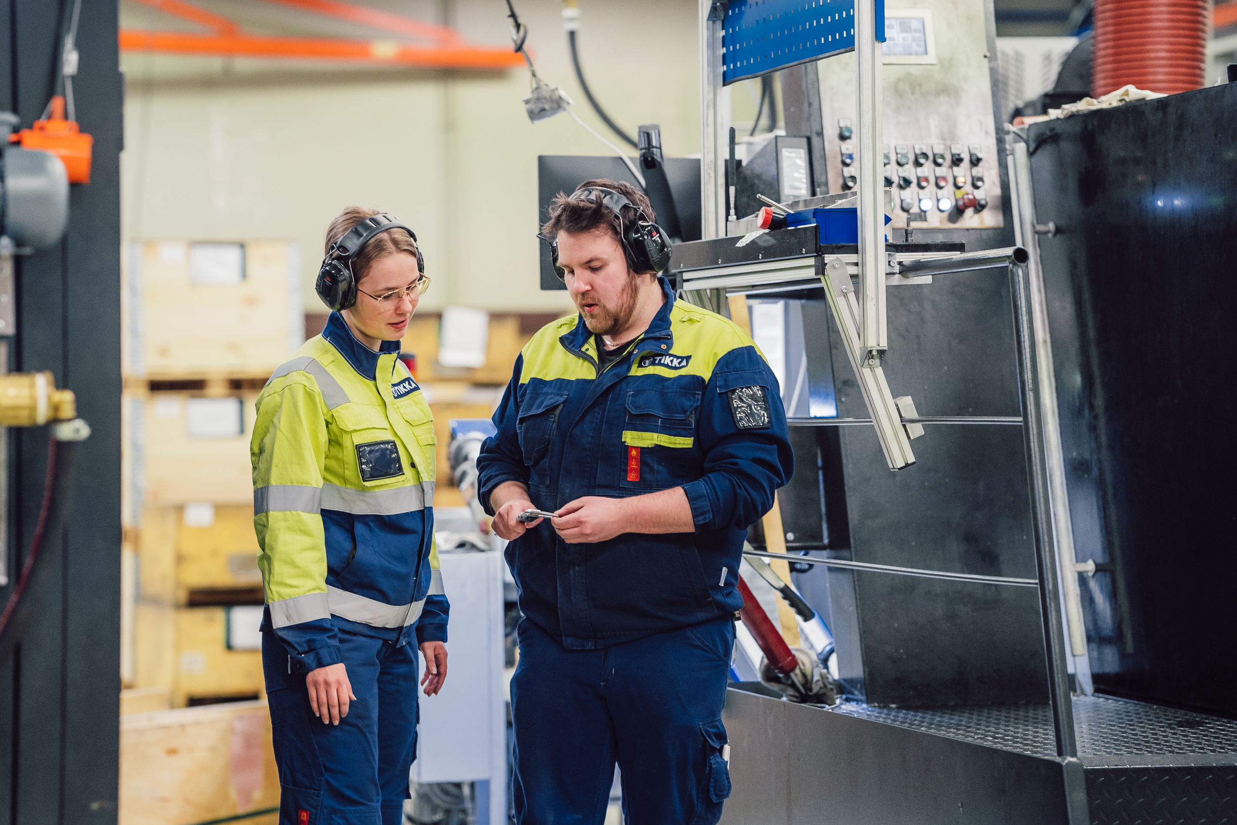 Two employees at the factory